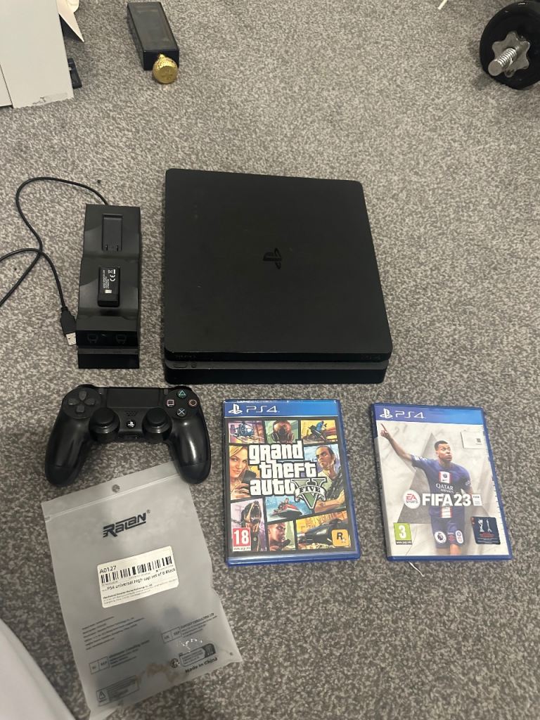 Sony PlayStation 4 Slim Console with Controller and Games