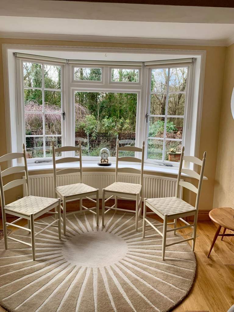 Four very good fired earth dining chairs in good condition