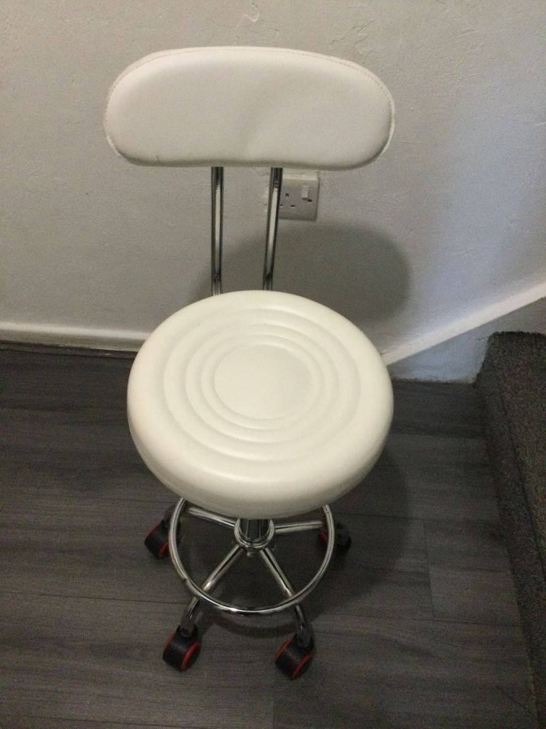 White Swivel Stool with Backrest and Wheels – Good Condition