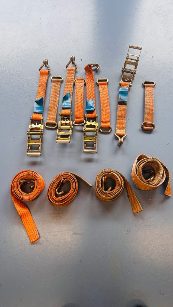 Car trailer ratchet straps. Wheel restraints