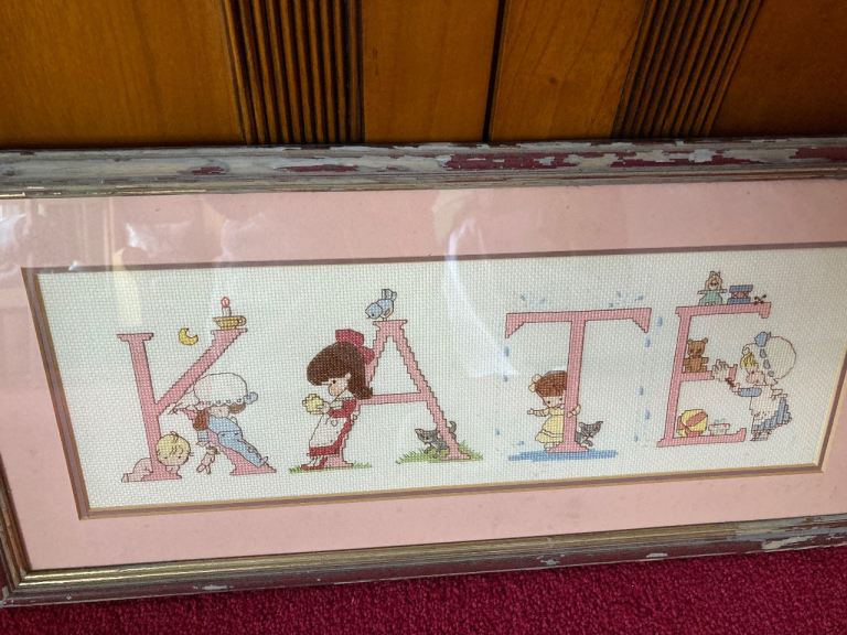 Cross-stitch framed picture for someon named Kate