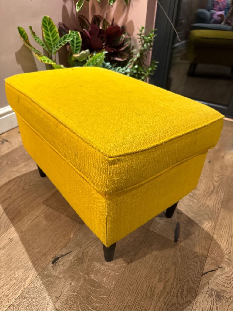 Ikea footstool in yellow