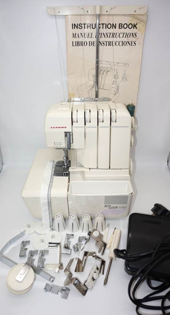 Janome MyLock 504D Overlocker Sewing Machine EXCELLENT WITH LOT OF ATTACHMENTS