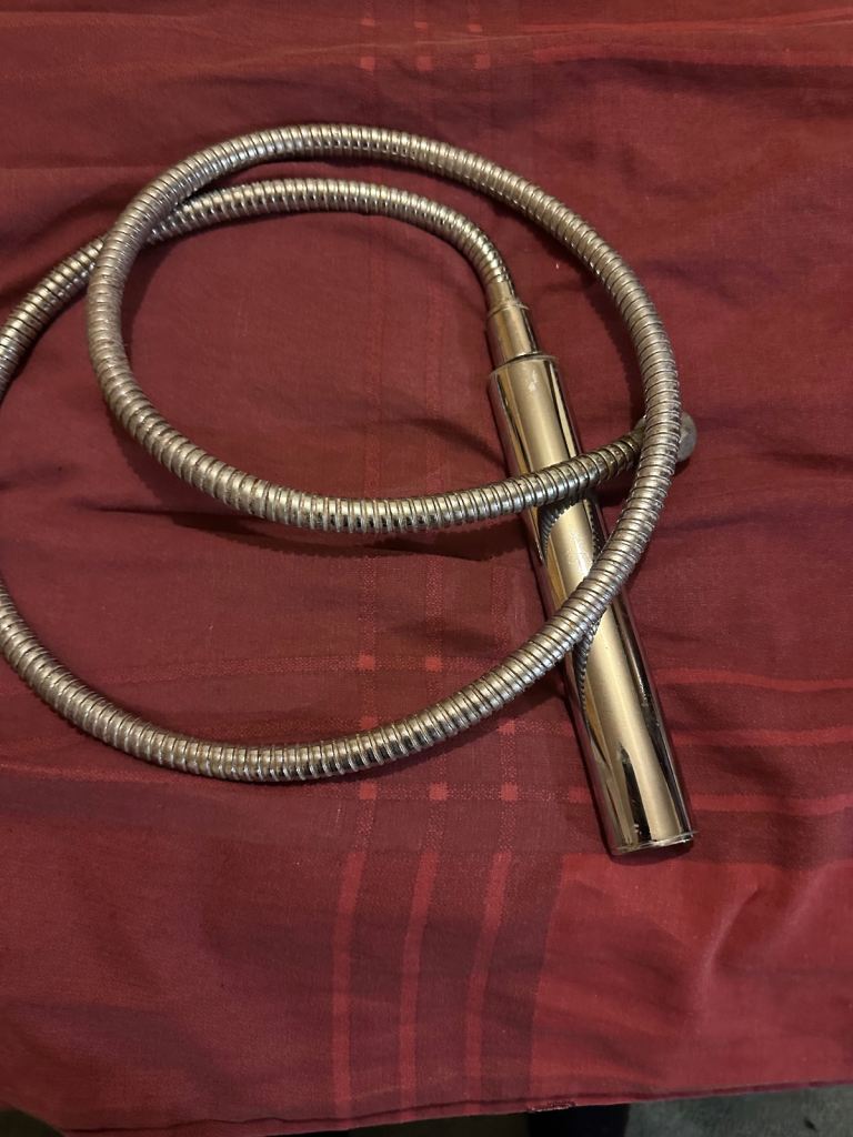 Used shower hose and head  In working condition  No leakage at all