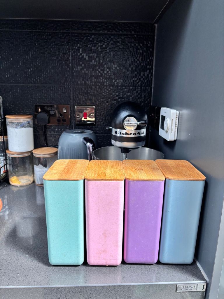 tupper ware or storage box with bamboo lid 