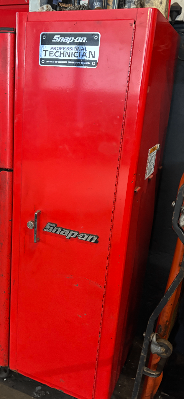 Snap on side cabinet locker