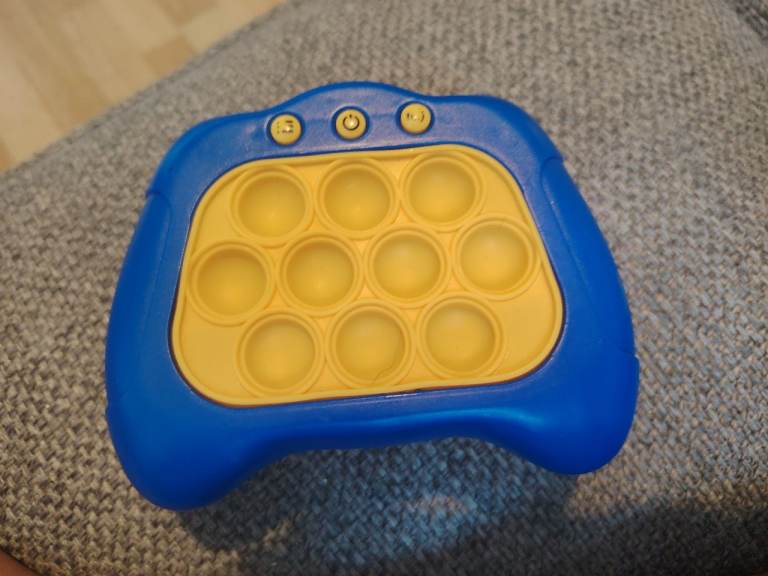 Blue and Yellow Pop It Fidget Toy Game – Good Condition
