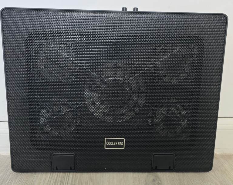 laptop cooling pad with a metal mesh surface 