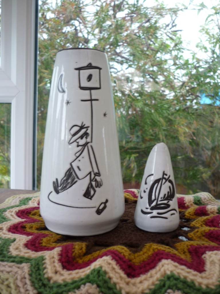 Really lovely fun vase together with its little companion