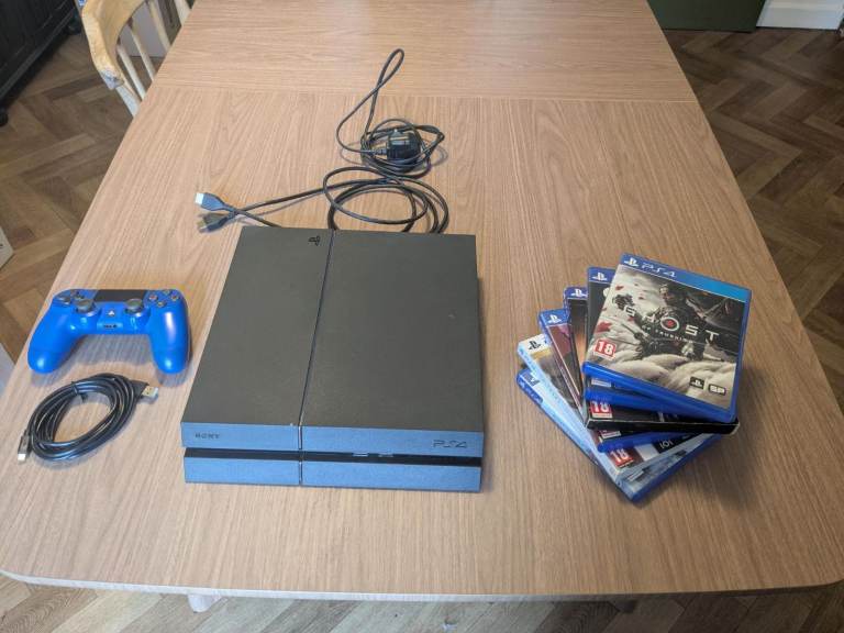 PS4 1TB console with Dualshock controller, HDMI cable, and 6 games. All great condition!