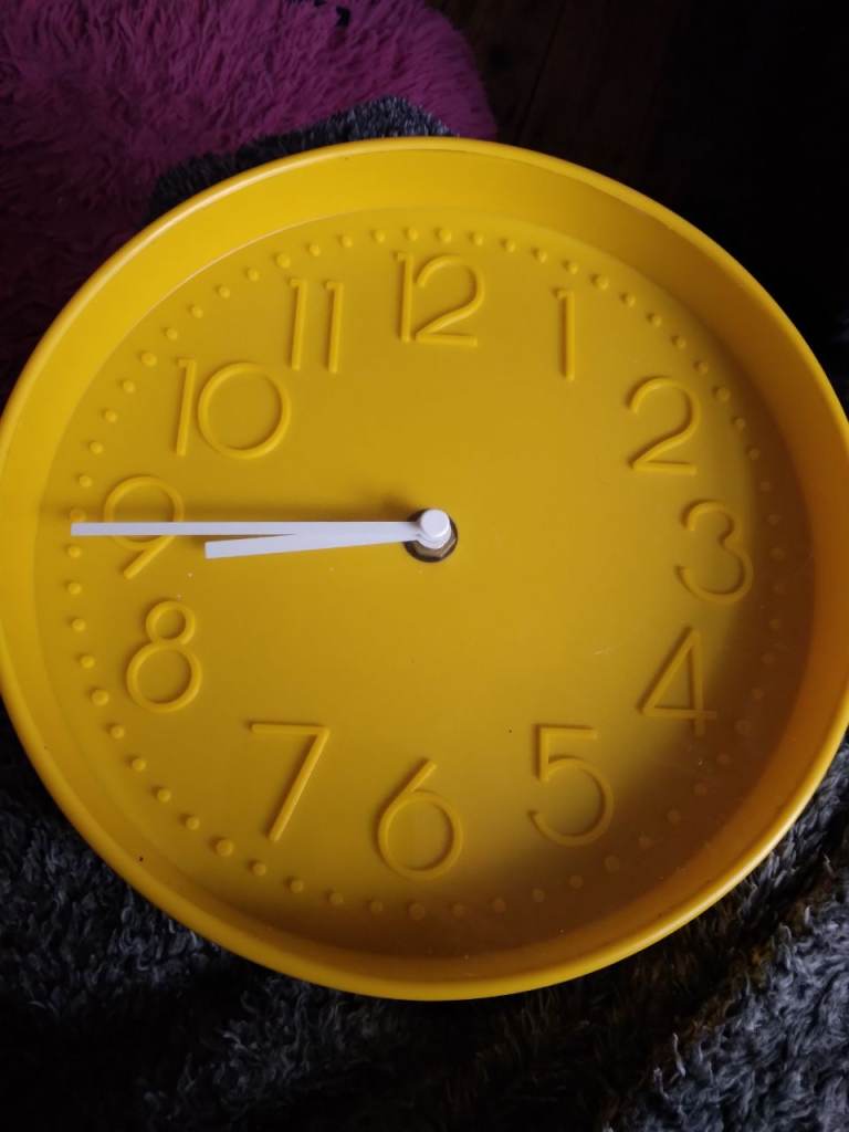 Bright Yellow Wall Clock – Good Condition