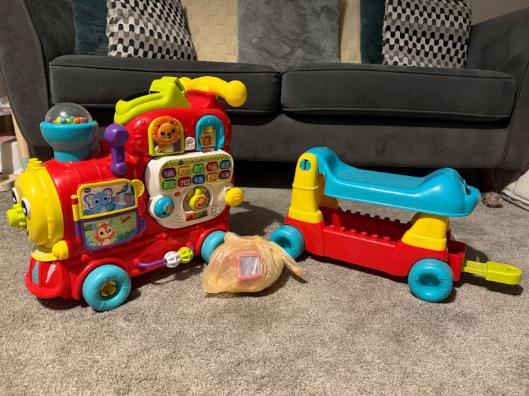 VTECH walker and sit on train 