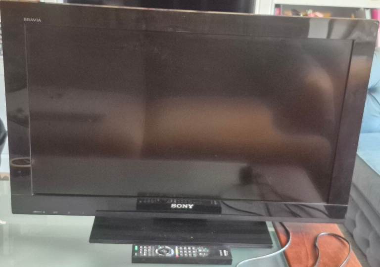 Sony Bravia 32" flatscreen tv with stand and remote 