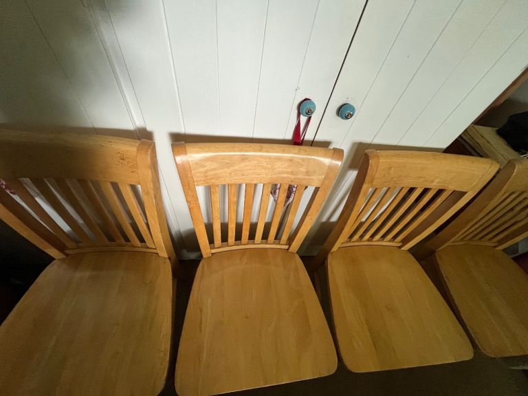 4 modern wooden dining chairs. 