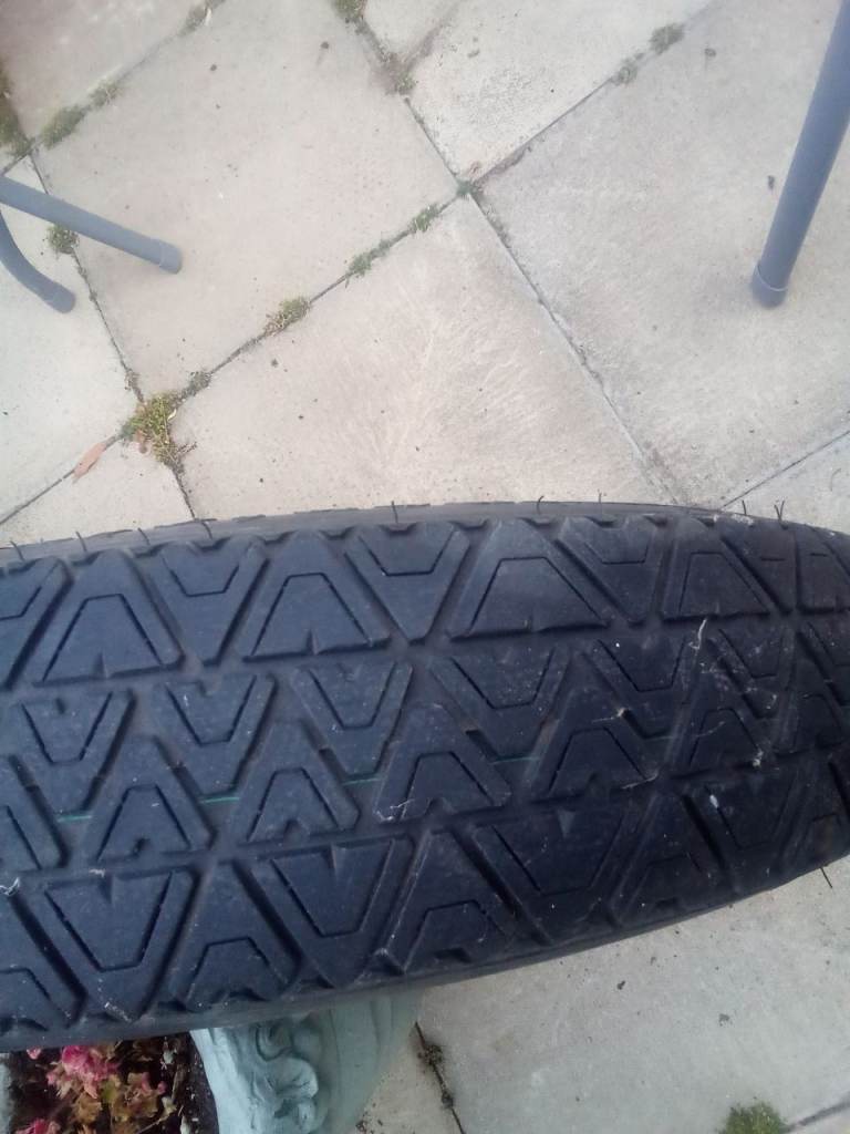 Two Ford mondo tyres.