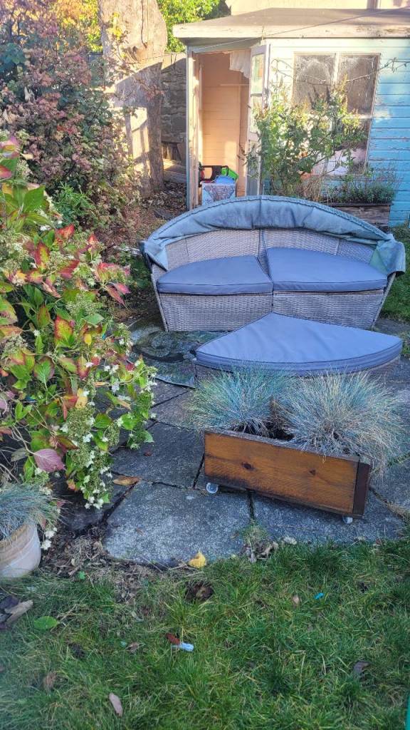 Garden sofa with cushions 
