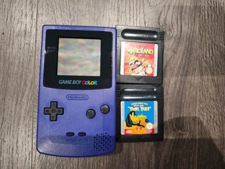 Purple Nintendo Game Boy Color with Wario Land II & Daffy Duck