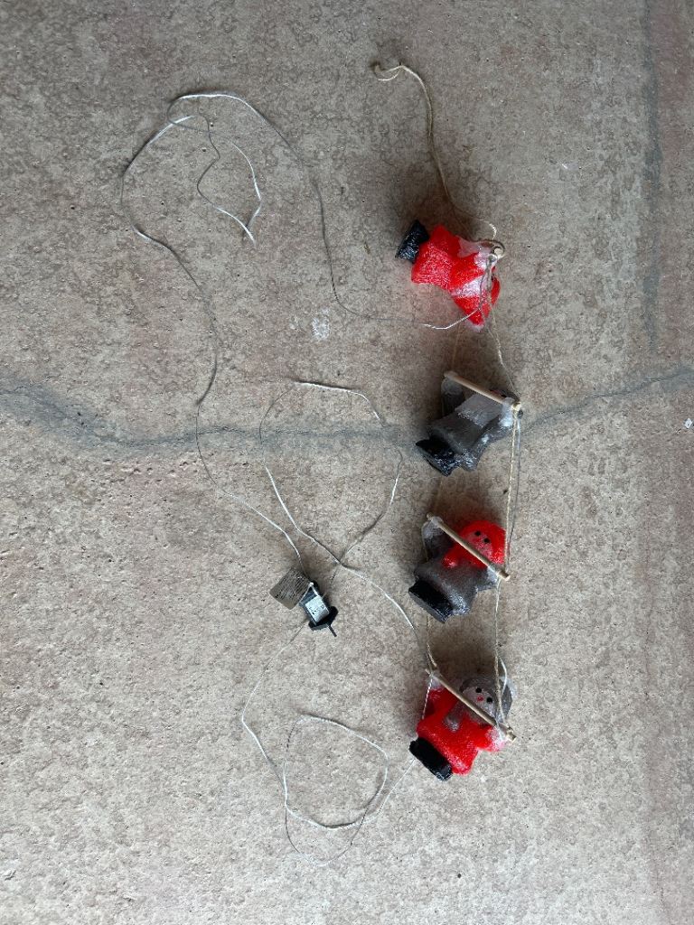 Climbing Santa Christmas Decorations - String of 4
