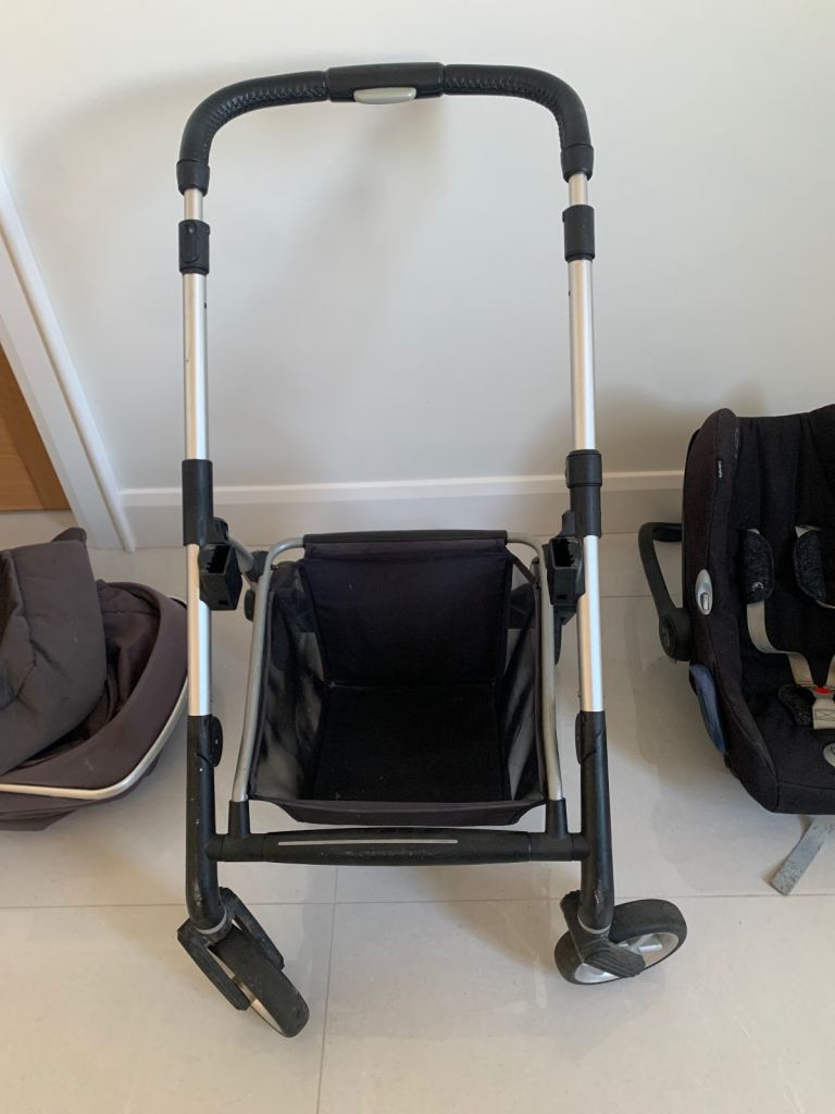 Silver cross pram and maxi cost baby carrier 