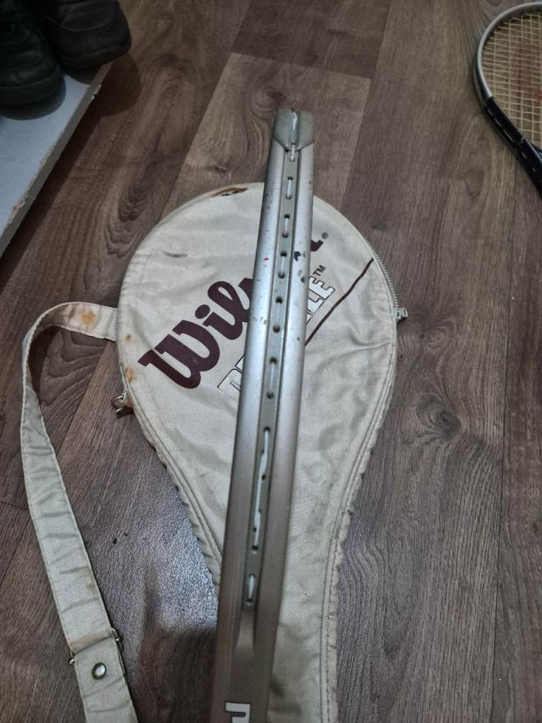 Tennis racket with case.