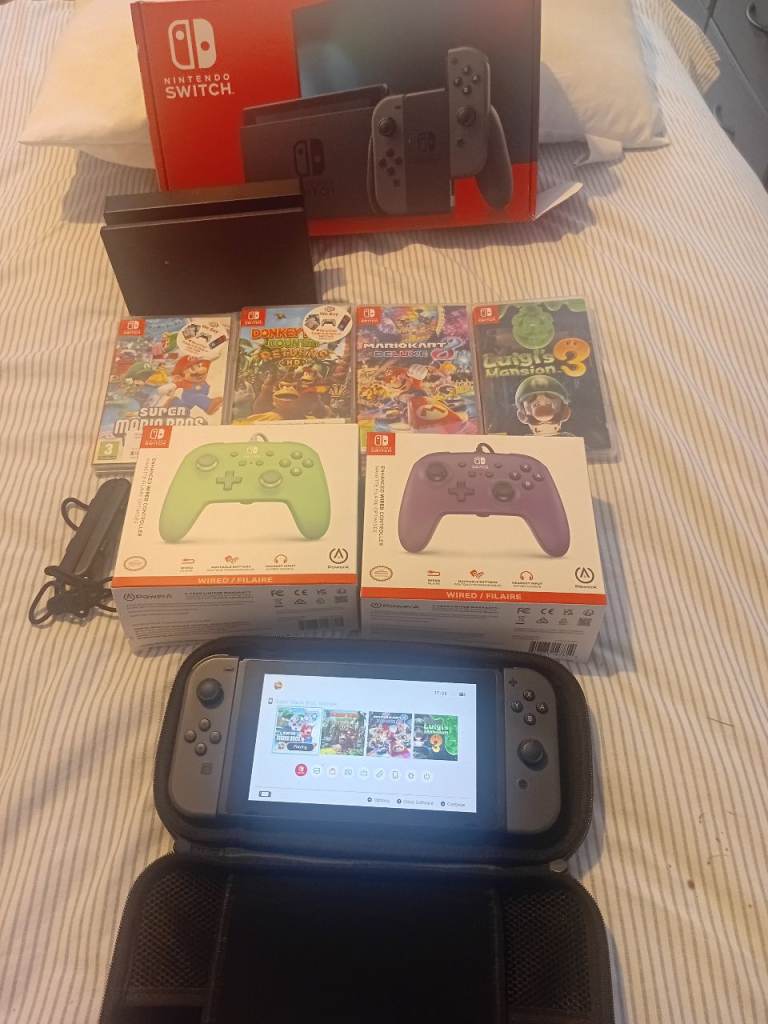 Nintendo switch .4 games and controllers