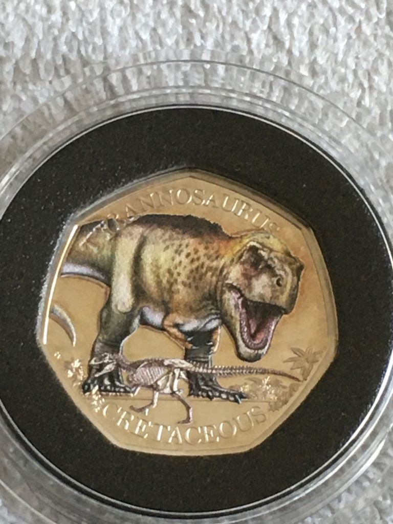 2 silver proof dinosaur coins