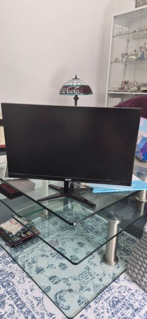 2 Black desktop monitors