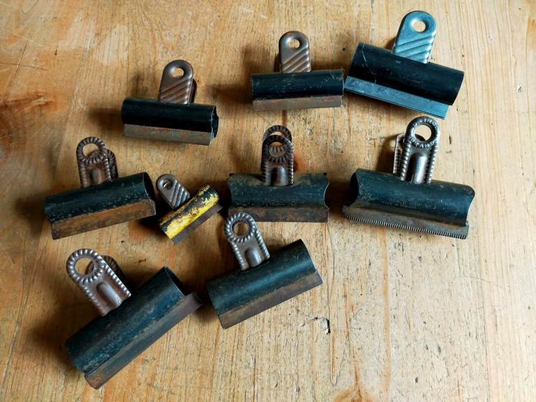 9 OLD BUT USFUL BULLDOG CLIPS  ****  TAKE A LOOK