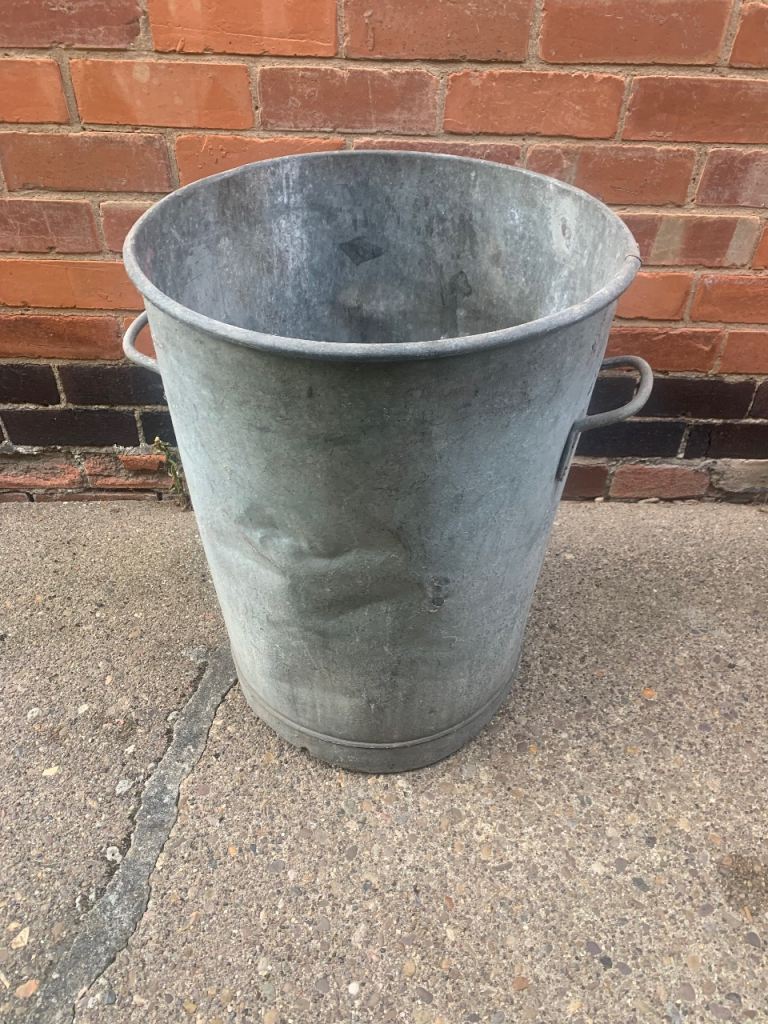 Antique dustbin planter