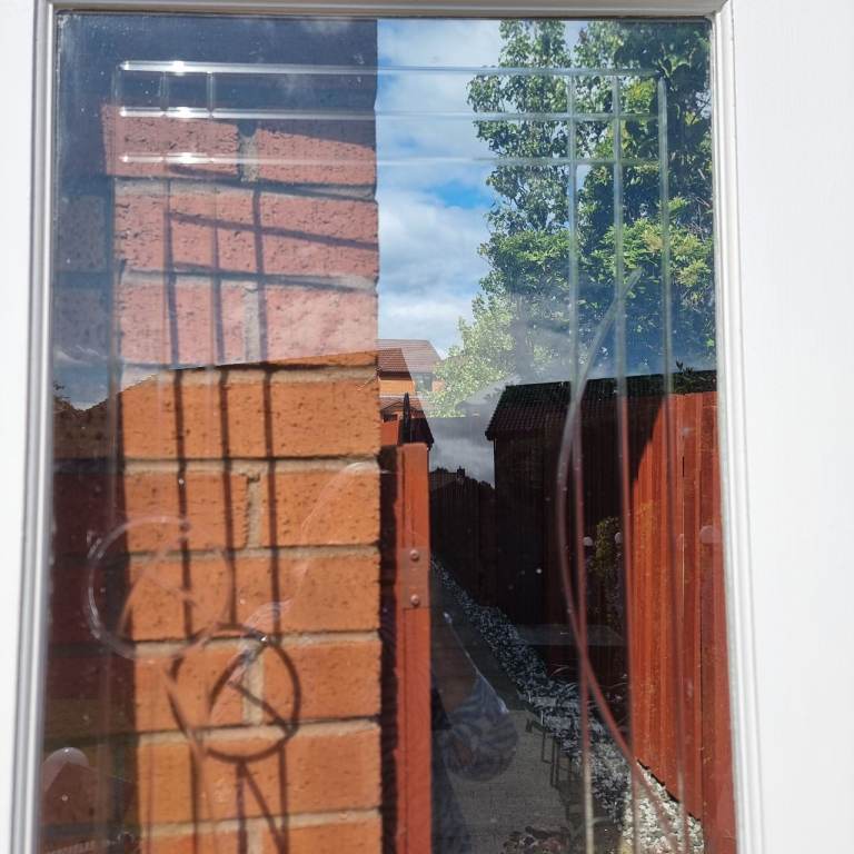 White wooden frame Rennie McIntosh  glass door