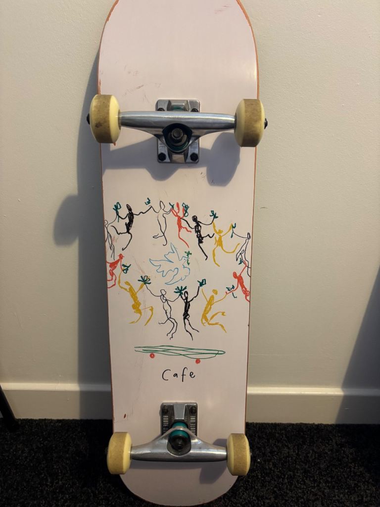 Cafe Skateboard – Good Condition, White Deck