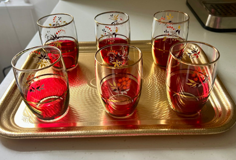 Vintage 1950s cranberry glasses and tra