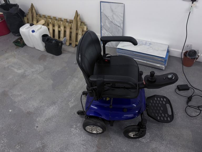 Blue Electric Wheelchair in Good Working Condition