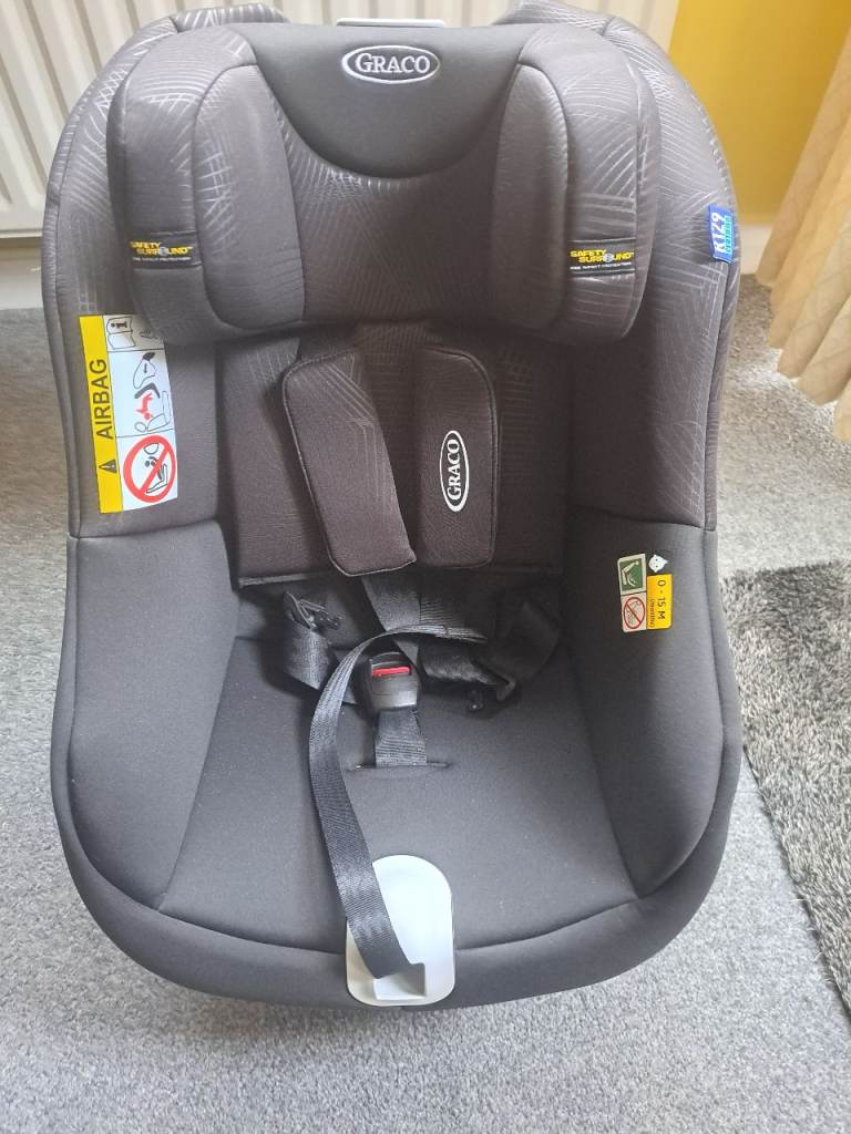Graco grey and black child car seat.