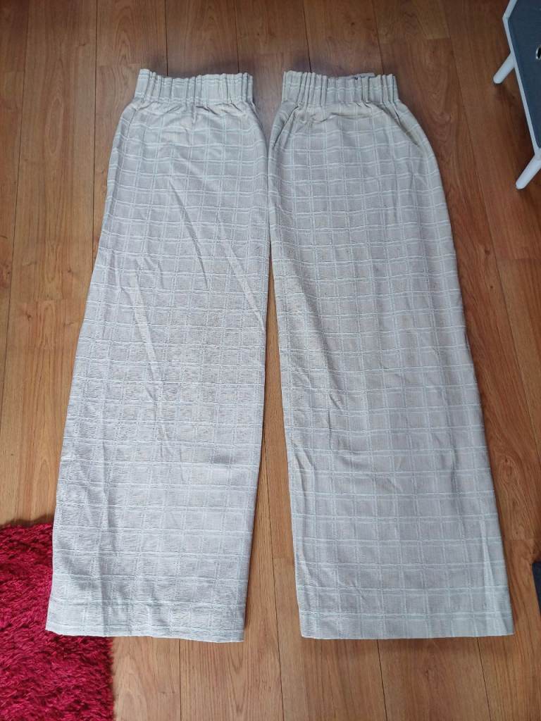 Pair of lined curtains, each curtain is 62" wide x 52" drop, very good condition 