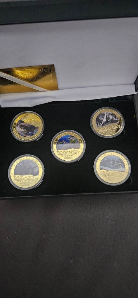 Commerative coins 24 carat gold 