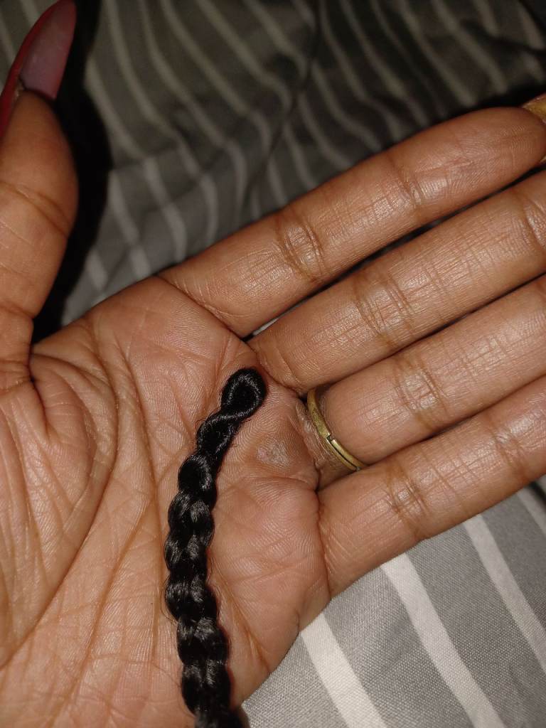 Whole head of black plaits