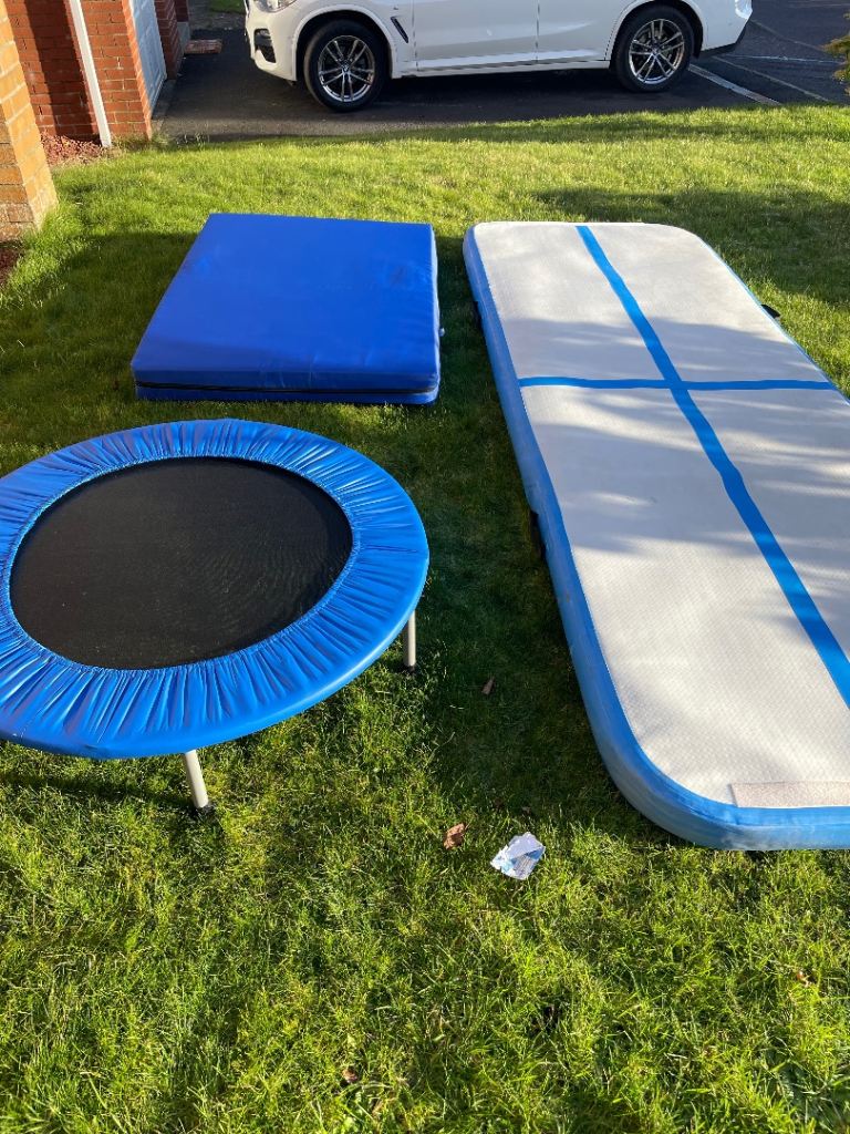 Gymnastics equipment including air track balance beam mimi trampoline and mat