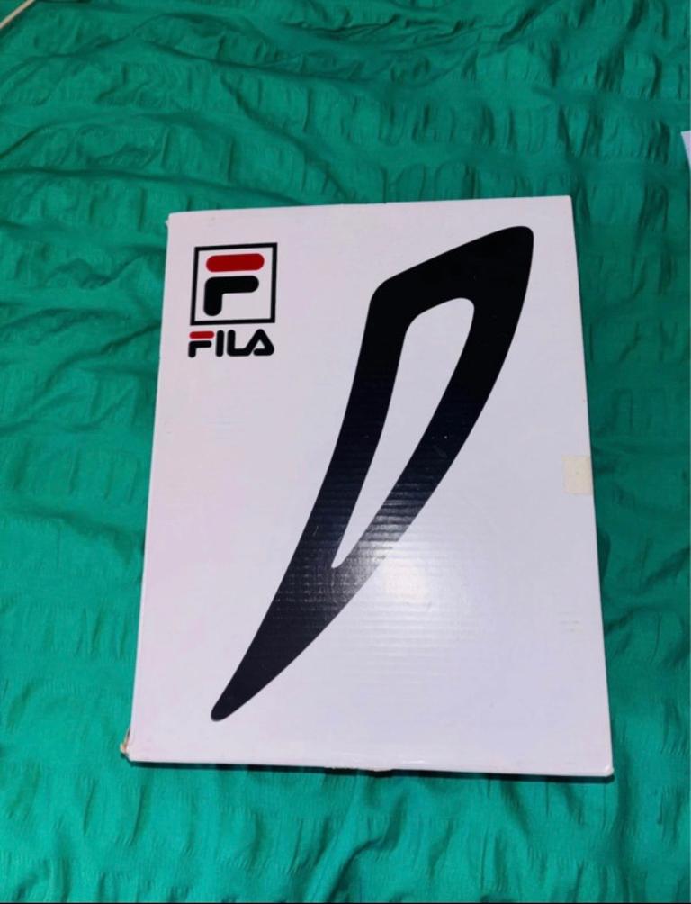 Woman’s White FILA trainers