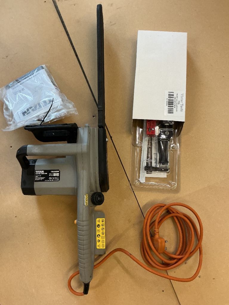 230V Titan Electric Chainsaw 40cm + sharpener, spare chain & 1L chain oil