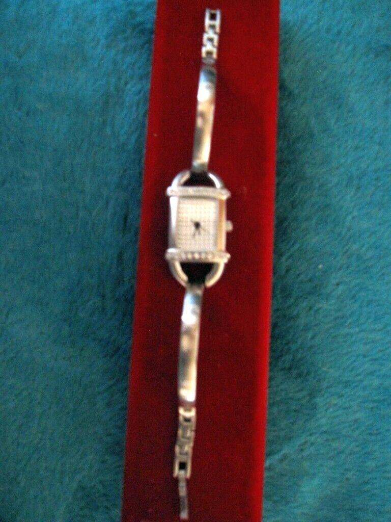 Ladies silver watch ( Bangle ) Needs new battery