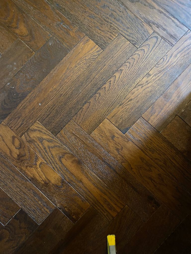 Unopened boxes of engineered wood flooring