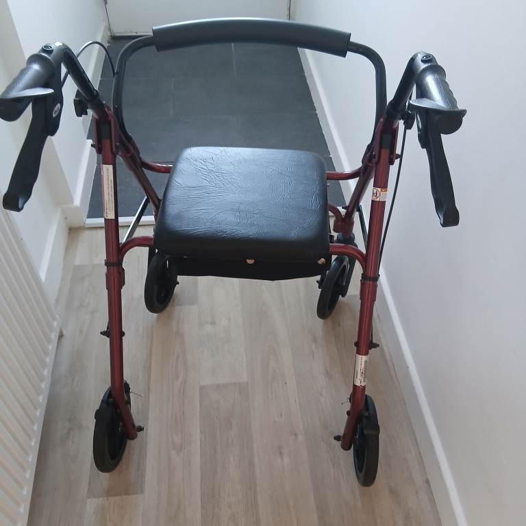 Red Mobility Walker with Seat – Good Condition
