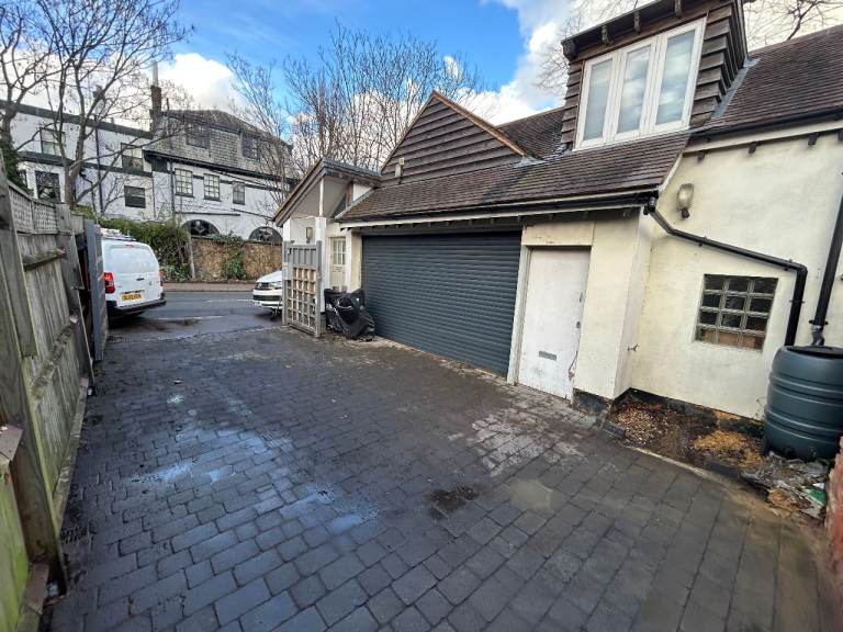 Ground floor storage with parking space in central Barnes, London SW13. 