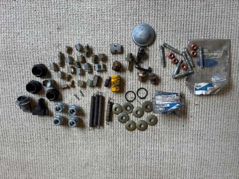 Selection of Ford car parts, springs bolts etc