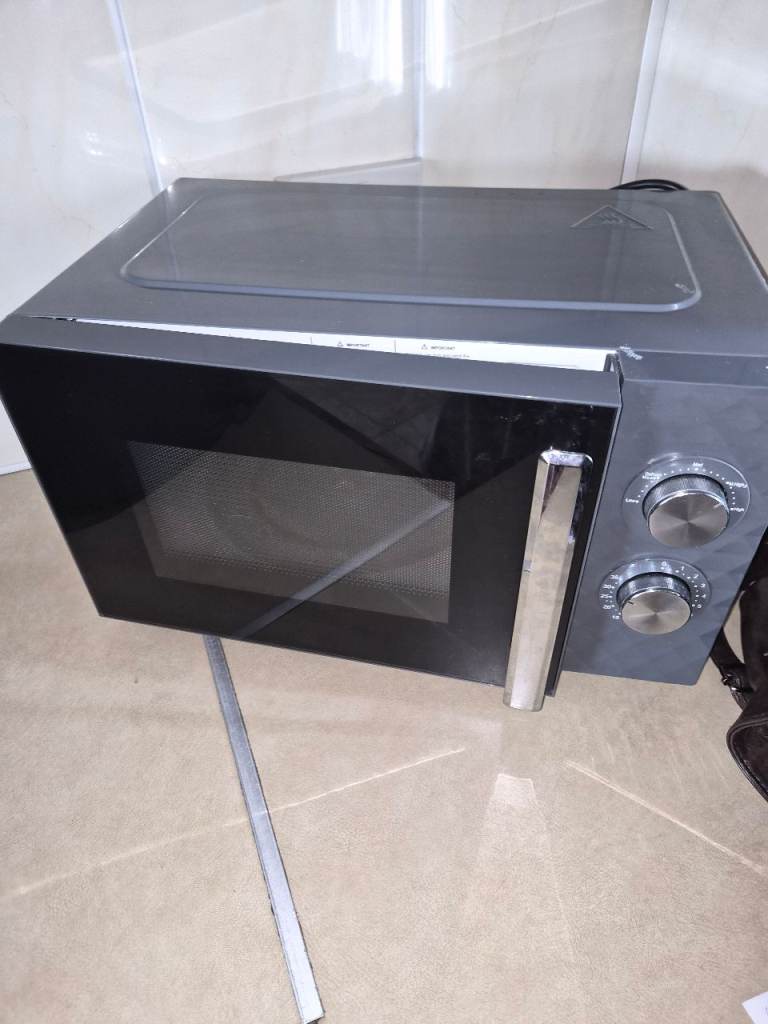 Grey Microwave Oven – Good Working Condition