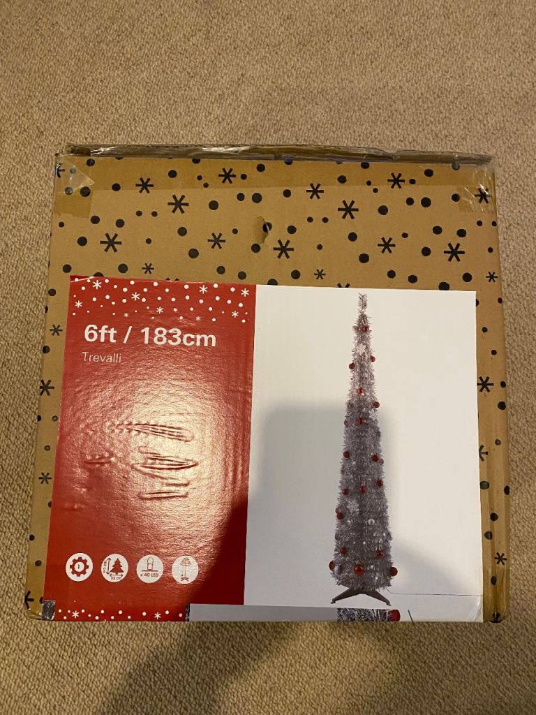 This is a 6ft (183cm) Trevalli artificial pop-up SILVER Christmas tree.  Height: 6ft / 183cm 