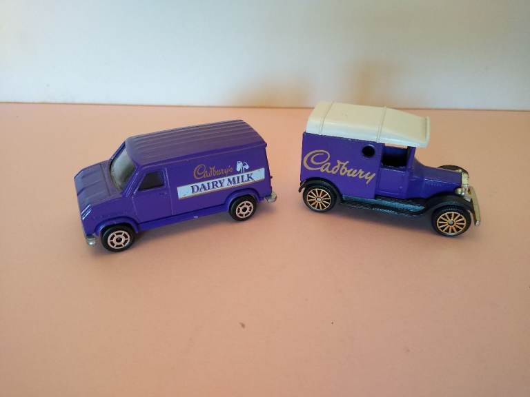 Two Vintage Cadbury's & Dairy Milk branded diecast vans
