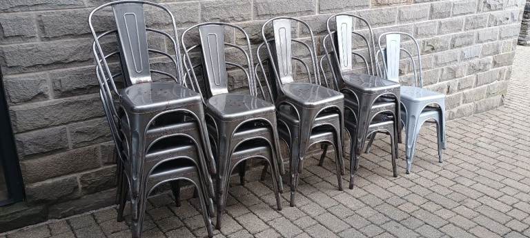 Good Condition Silver Metal Stacking Chairs