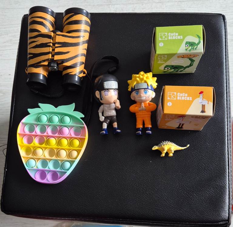 Kids Toy Bundle: Binoculars, Pop-It, Naruto Figures & Dino Toys